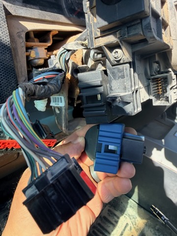 Service van open with cars on a service call